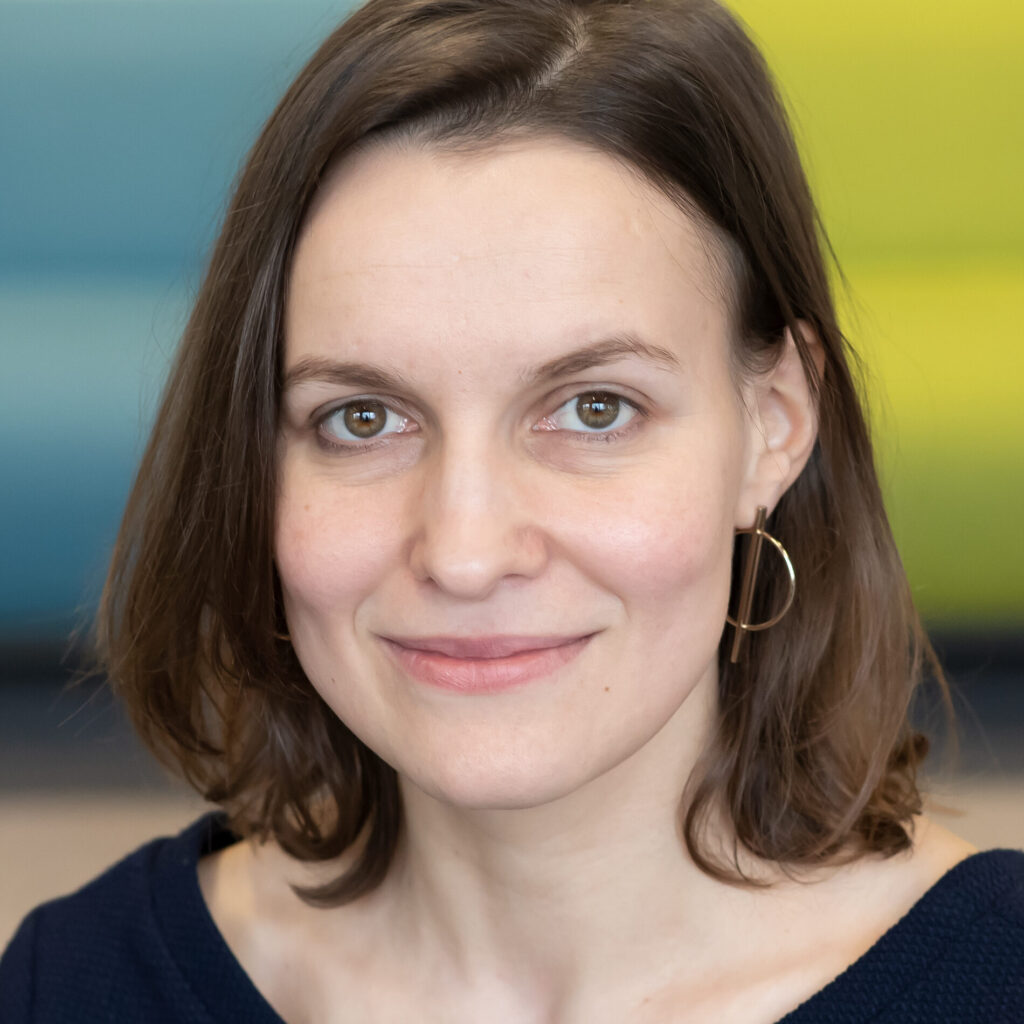 lena karvovskaya is around 30, dark hair shoulder length